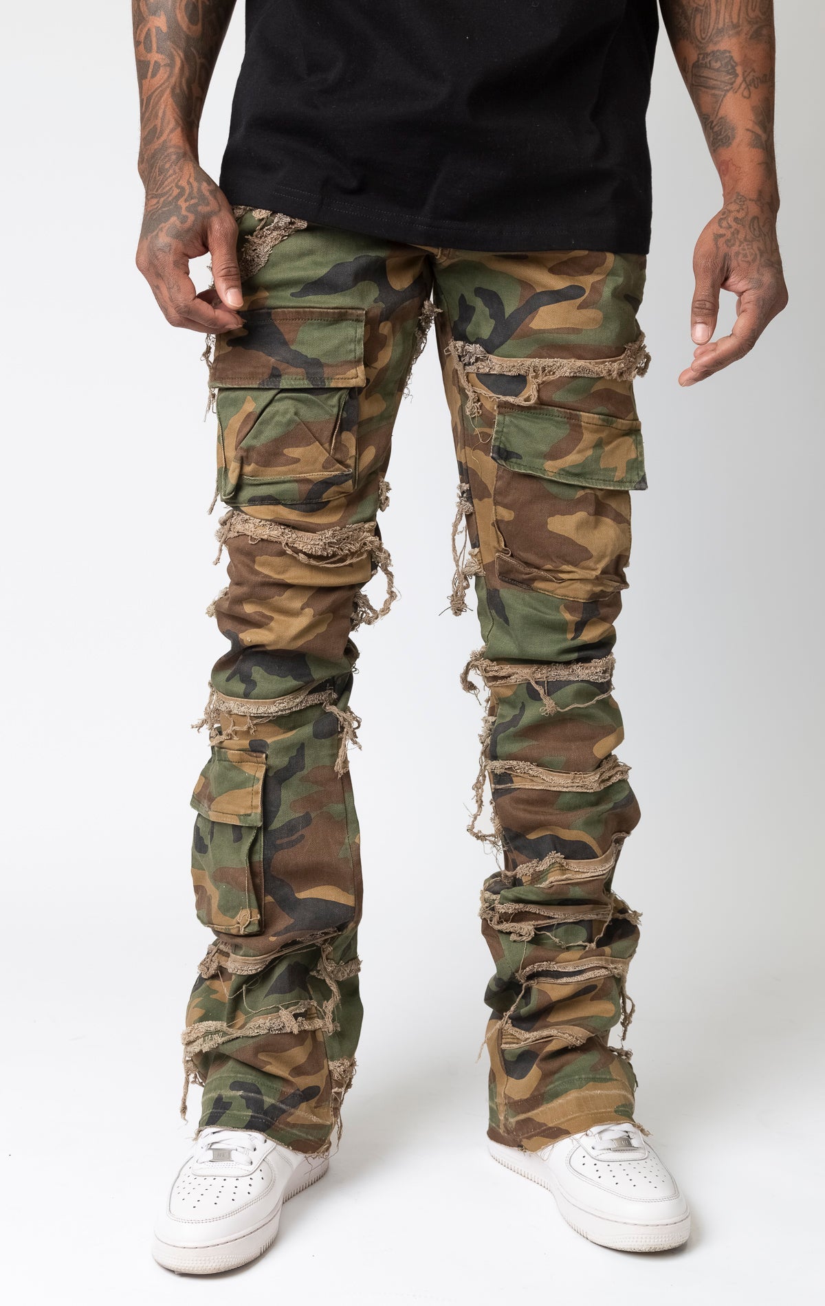 Camo pants with premium stretch, 2% spandex, and premium leather waist label, featuring a button fly
