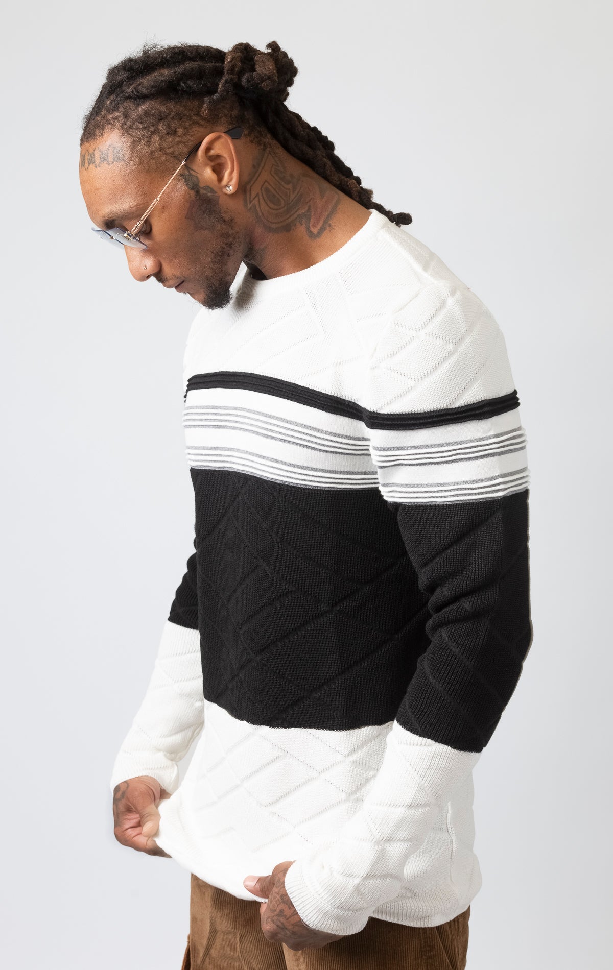 Cozy long-sleeve crewneck pullover sweater.