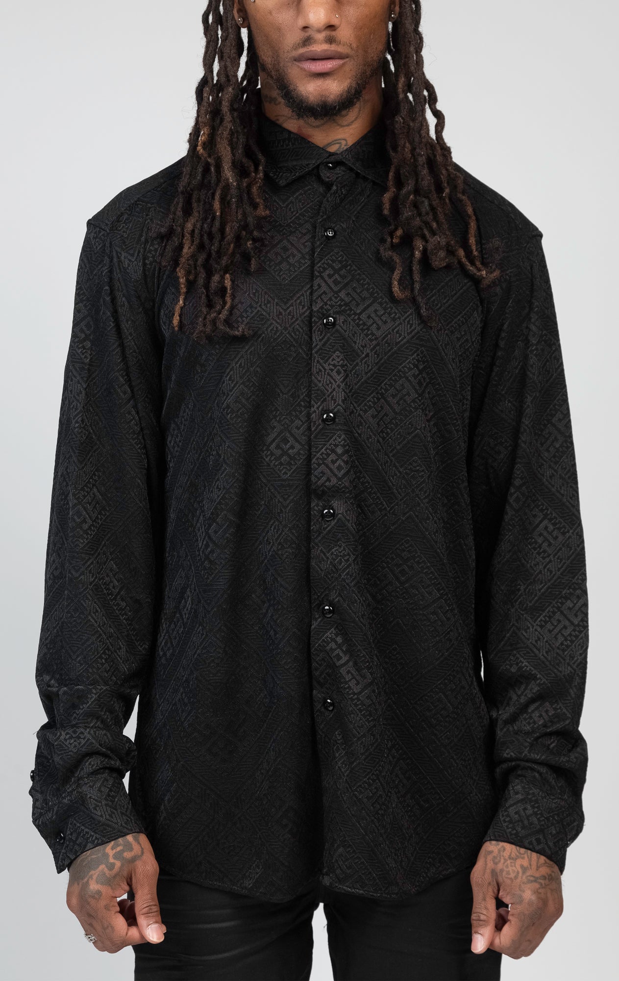 Black stylish and comfortable slim-fit long-sleeve shirt featuring a soft and breathable fabric, an eye-catching all-over seamless pattern, and a versatile design.