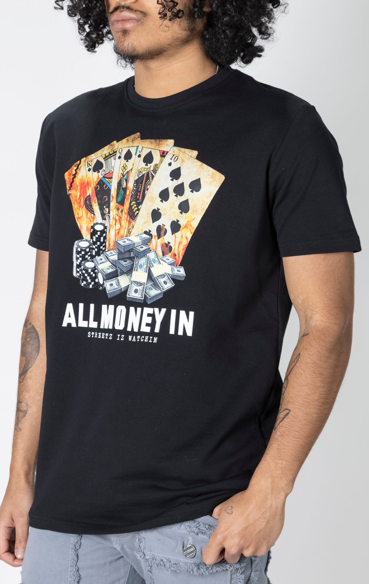 Black t-shirt with "All Money In" graphic.