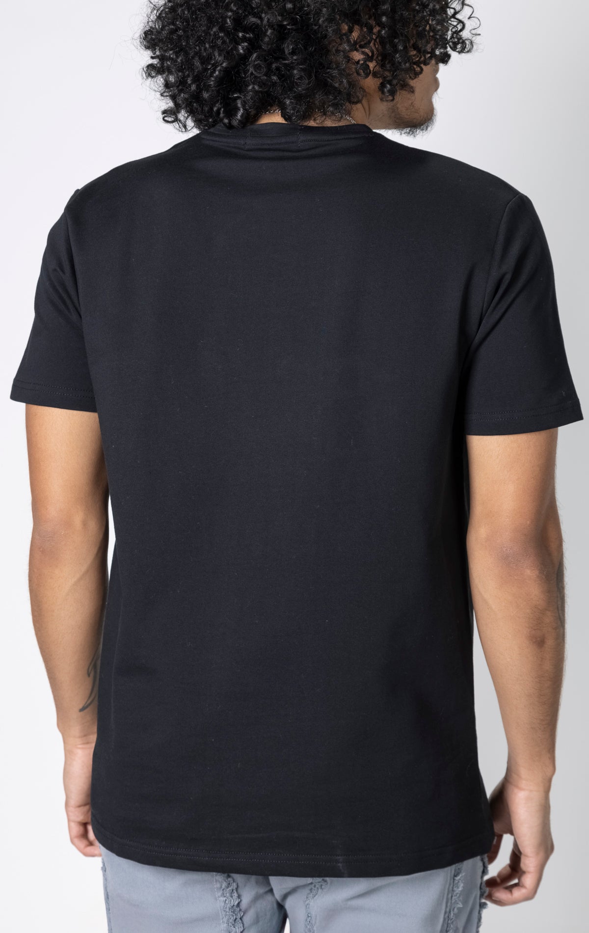 Black t-shirt with "All Money In" graphic.