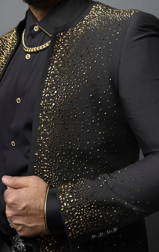 Embellished blazer with a dazzling interplay of light and texture, perfect for special occasions, showcasing opulence and style.
