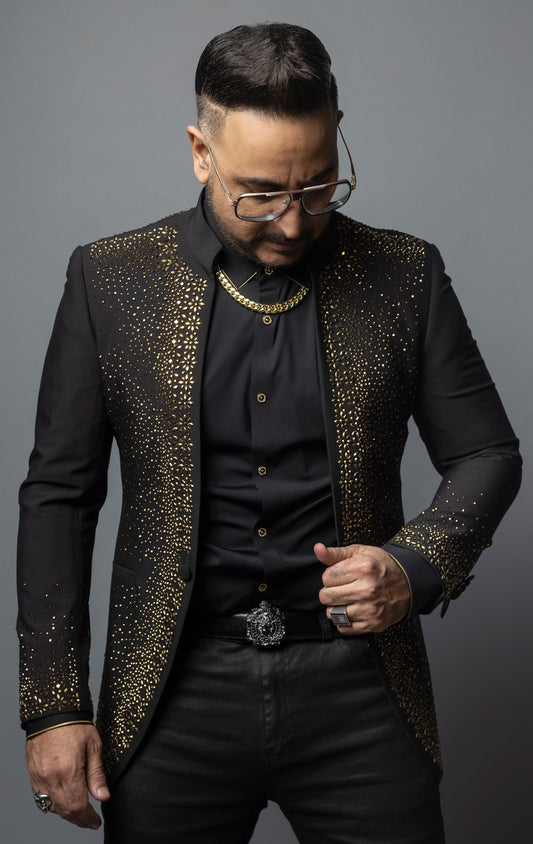 Embellished blazer with a dazzling interplay of light and texture, perfect for special occasions, showcasing opulence and style.