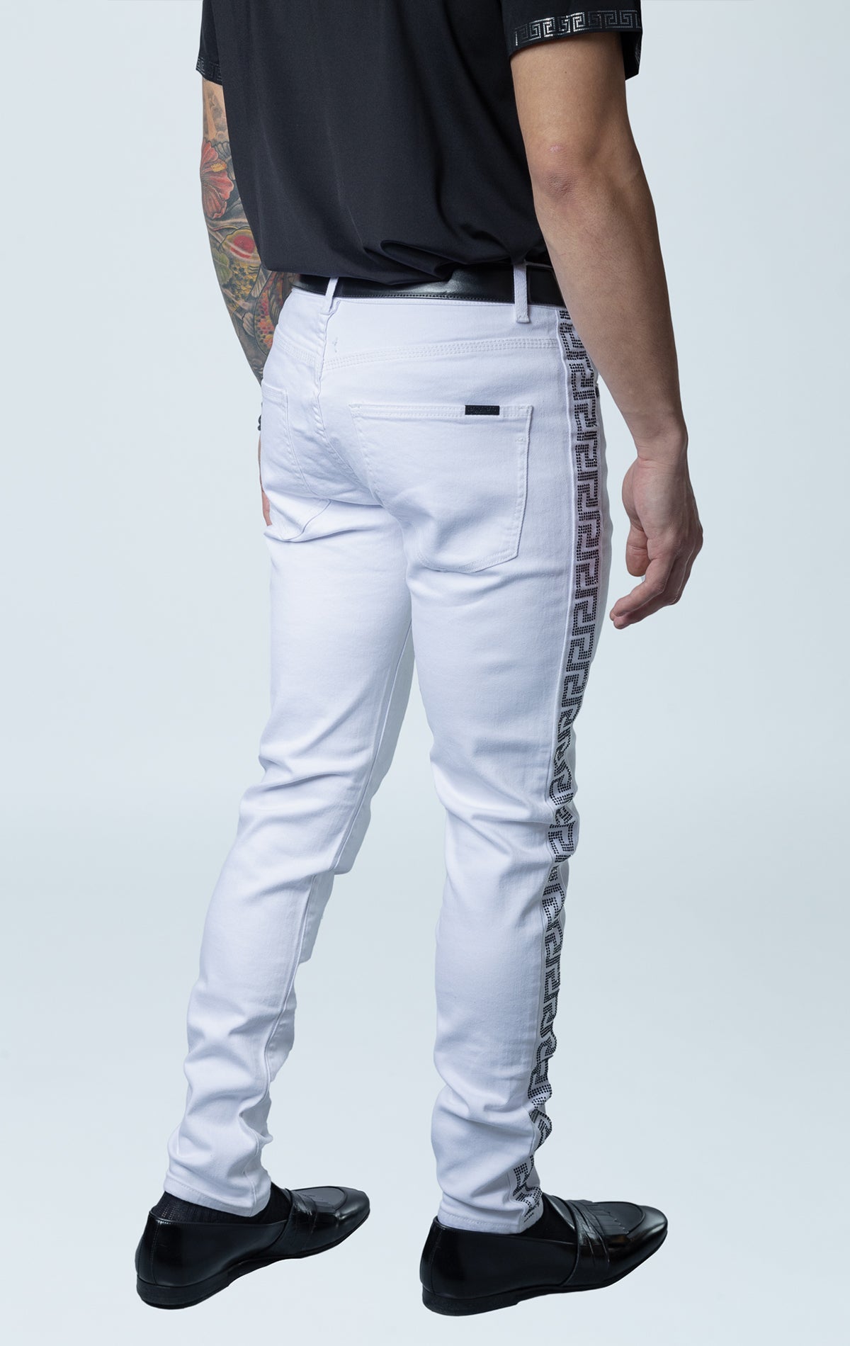 High-quality denim jeans with side stripe taping and a slim-fit design, made from 98% cotton and 2% spandex for comfort stretch.