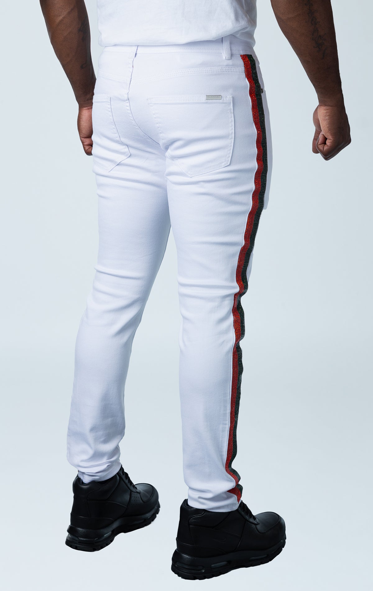 White premium denim pants with unique side strip design.