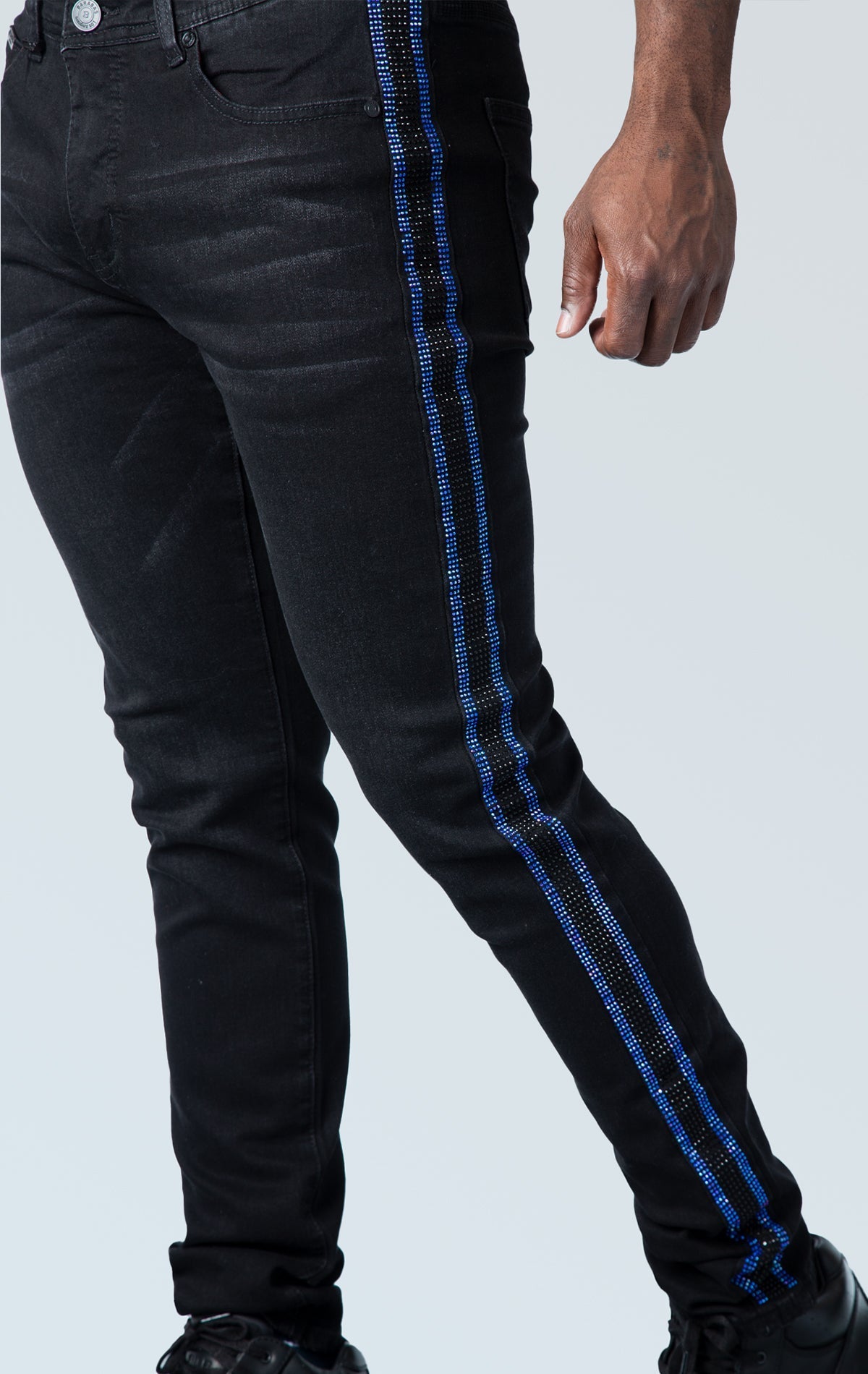 High-quality denim jeans with side stripe taping and a slim-fit design, made from 98% cotton and 2% spandex for comfort stretch.