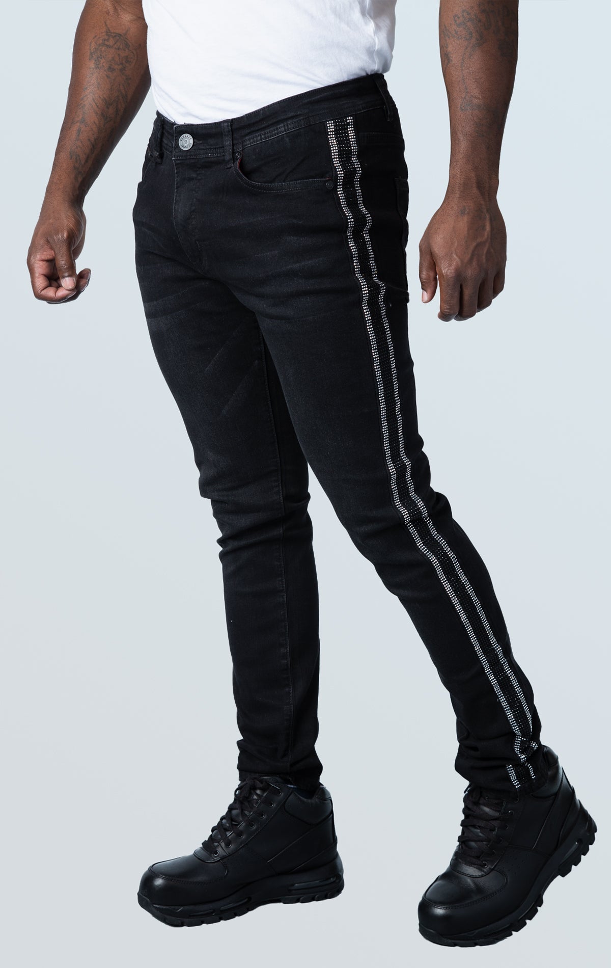 High-quality denim jeans with side stripe taping and a slim-fit design, made from 98% cotton and 2% spandex for comfort stretch.