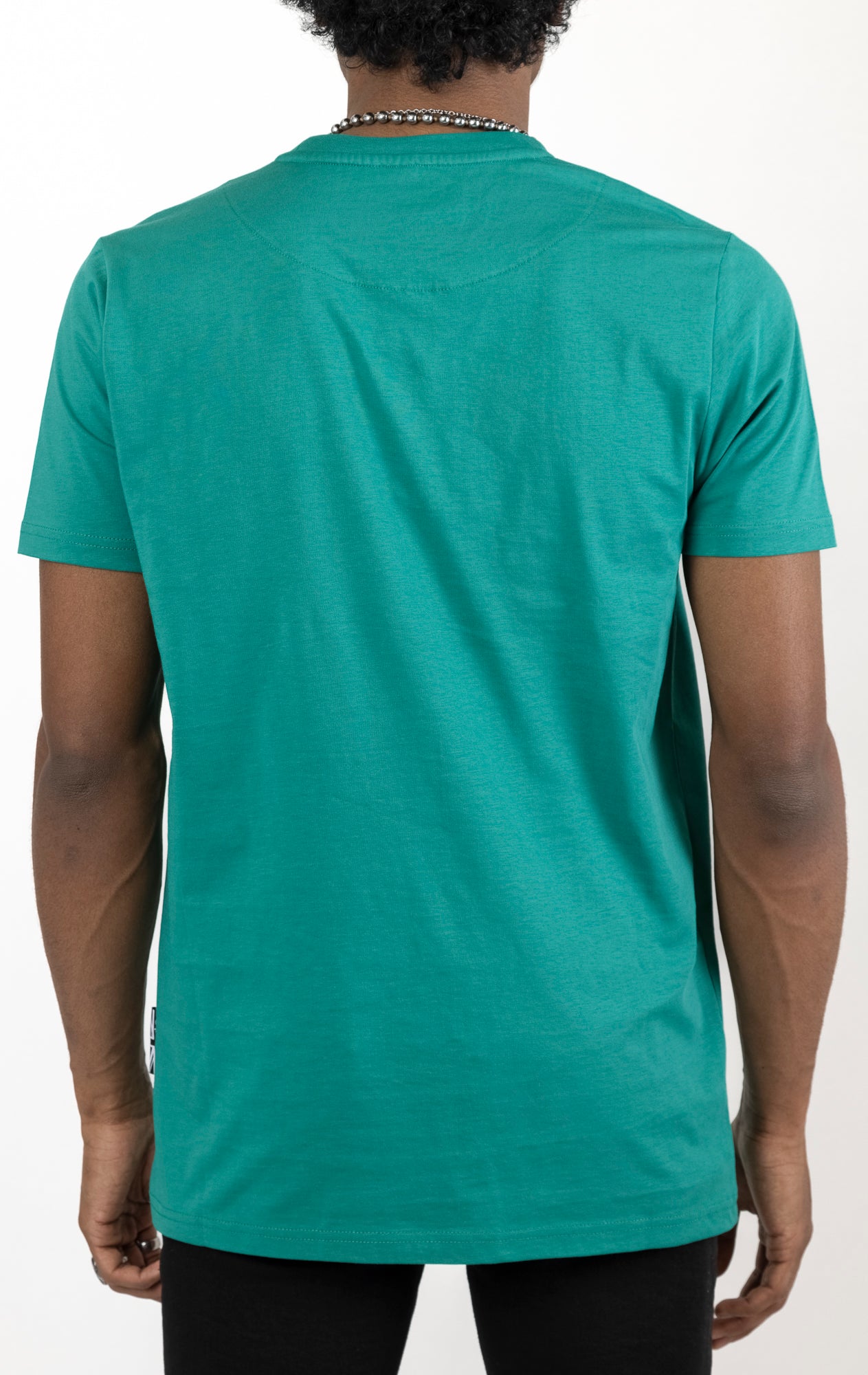 Lagoon Men's regular fit t-shirt in a variety of colors. The shirt features a slightly elongated sleeve, a fitted neckline, and a straight body. It has a "Temptation" front print with 3D embroidery. Made from 100% cotton jersey (190gsm). A "blessed" slogan is printed on the inner neck binding and a woven side seam tab with "blessed" is also included.