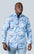 White long sleeve button up dress shirt with  blue floral pattern
