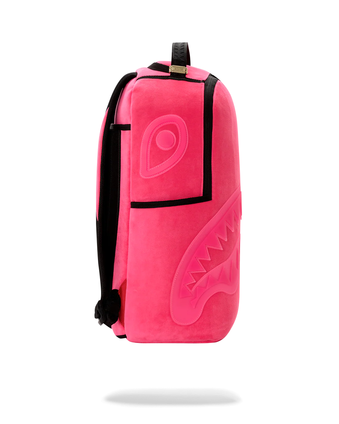 A bright pink backpack with black trim and a tonal shark-face graphic on the front, shown against a plain white background.