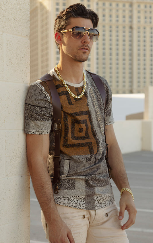 Greek Key Rhinestone Tee. Features a classic crewneck, short sleeves, and a stunning Greek key pattern embellished with rhinestones.