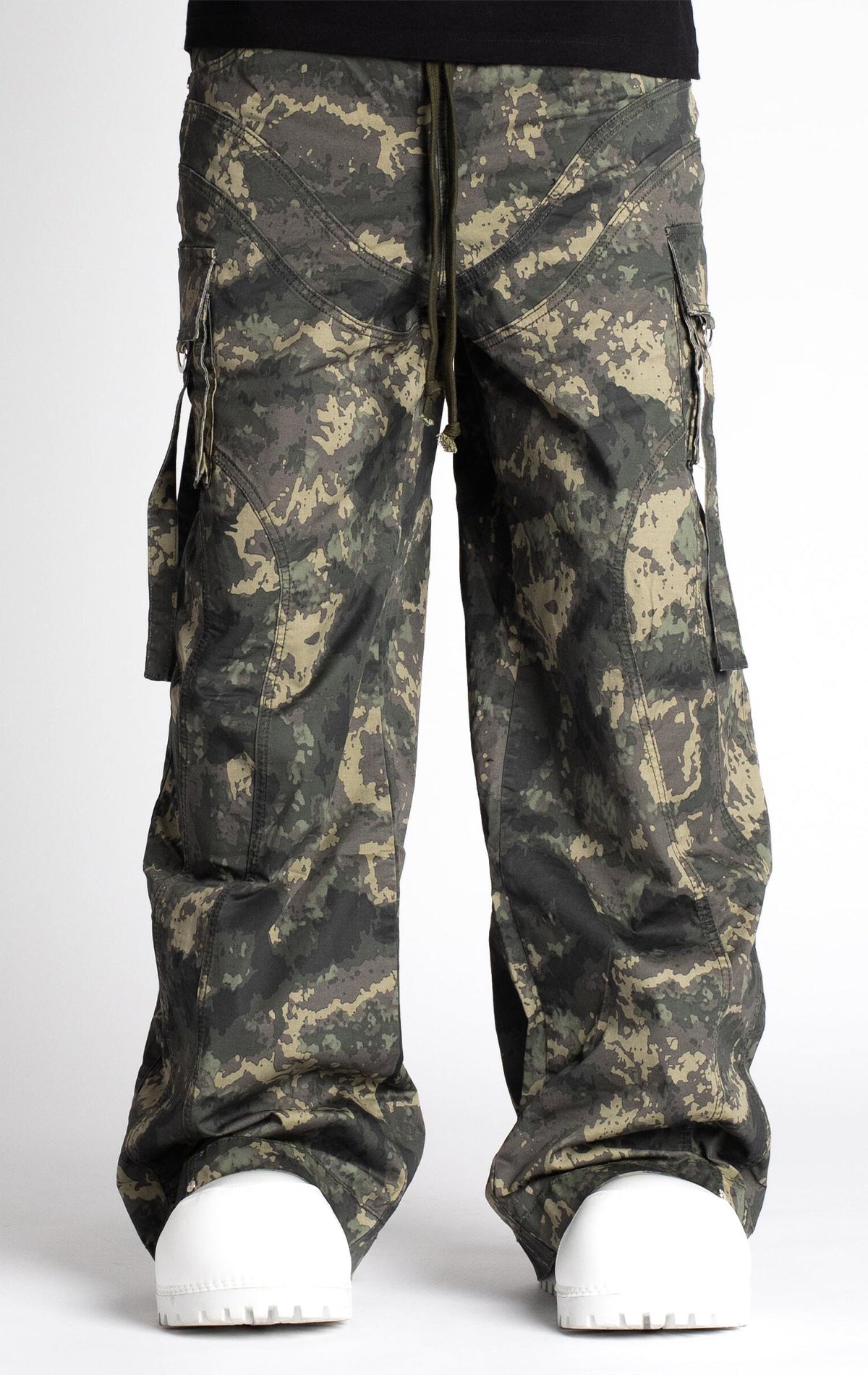 Camo Extra Baggy Cargo Pants V3. Features a loose fit, multiple pockets, adjustable waist strings, and a camo pattern