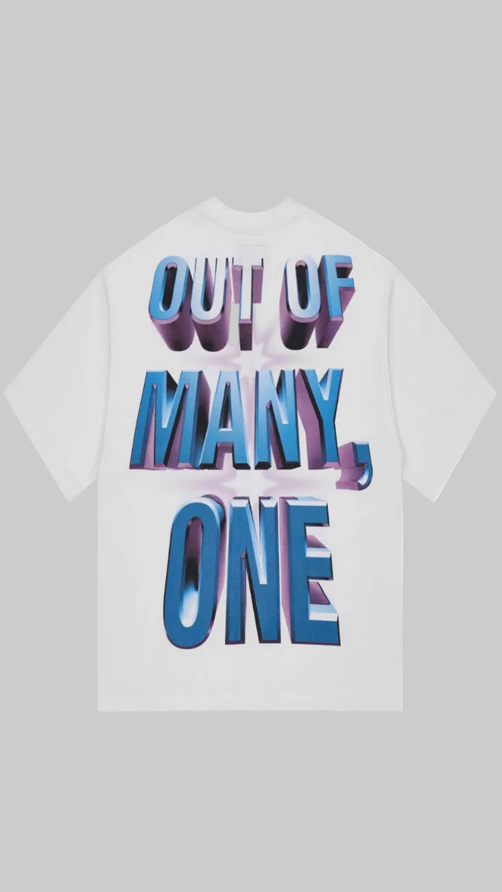 White t-shirt with colorful text 'OUT OF MANY, ONE' on a white background