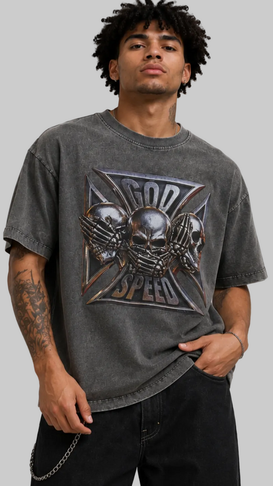 Person wearing a dark gray t-shirt with a graphic design on a plain background