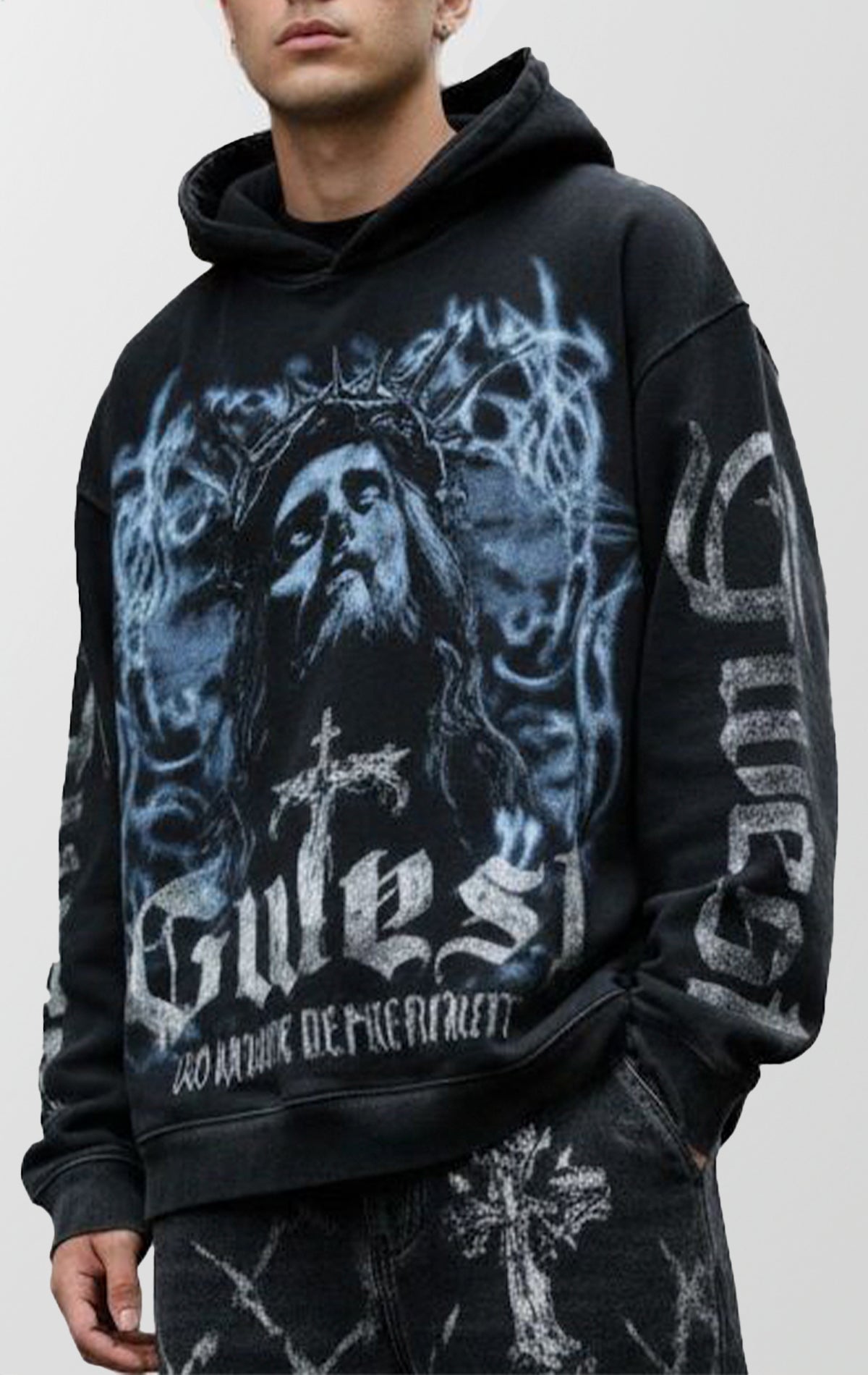 A premium black streetwear hoodie featuring a bold graphic design on the front centered around spiritual themes.