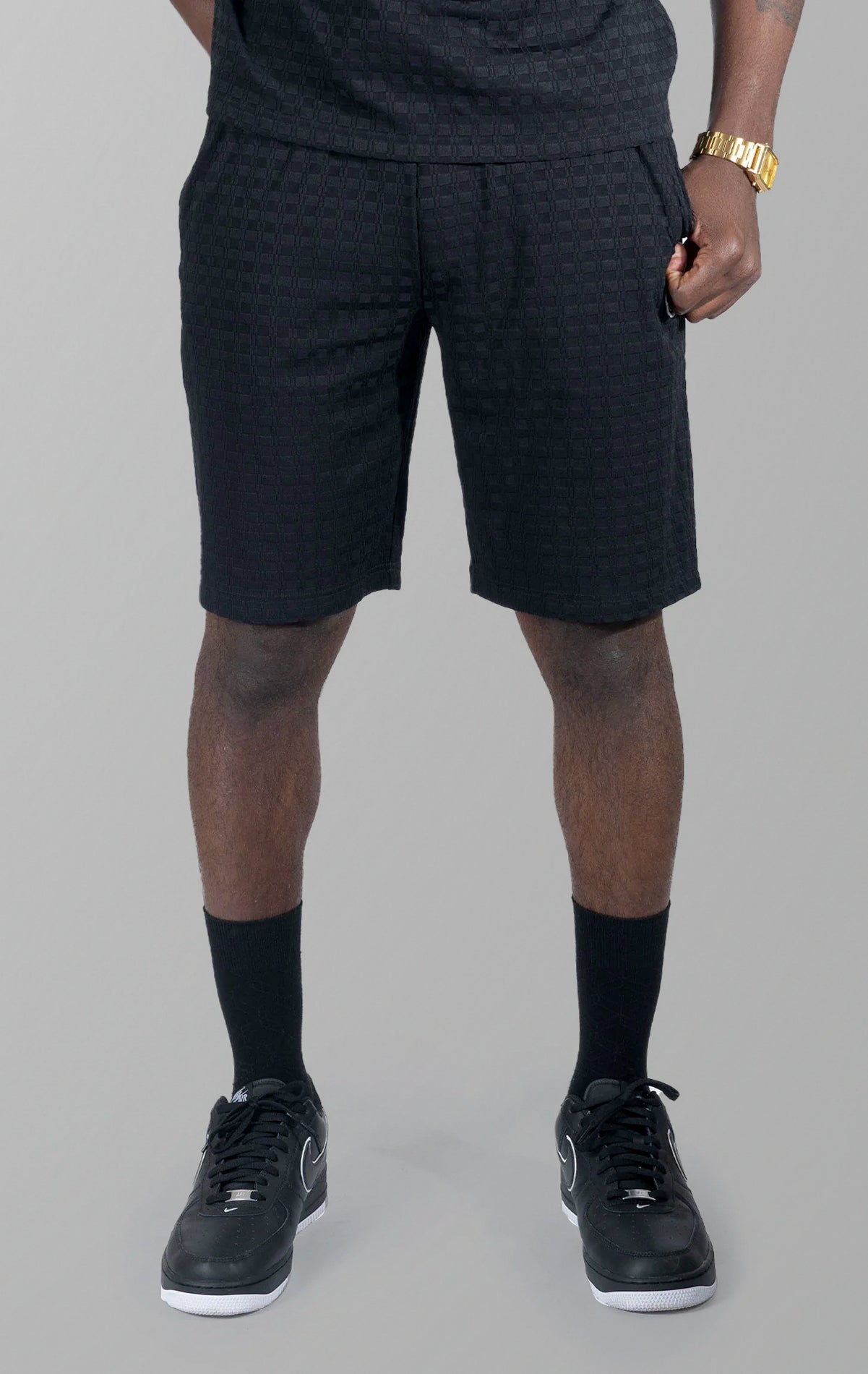 Modena Knit Shorts in black.  Made from a high-quality blend of 95% cotton and 5% spandex for a soft and comfortable feel. Features a unique colored blocking design and a pre-shrunk true-to-size fit.