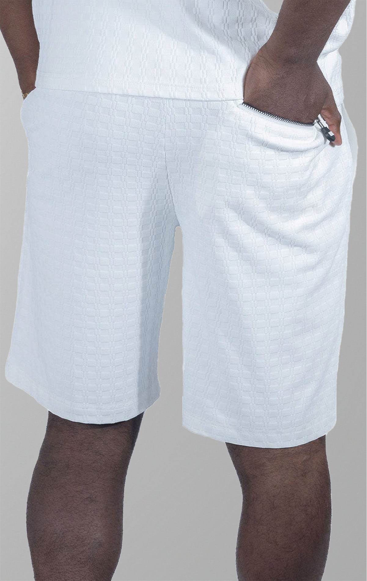 Modena Knit Shorts in white. Made from a high-quality blend of 95% cotton and 5% spandex for a soft and comfortable feel. Features a unique colored blocking design and a pre-shrunk true-to-size fit.