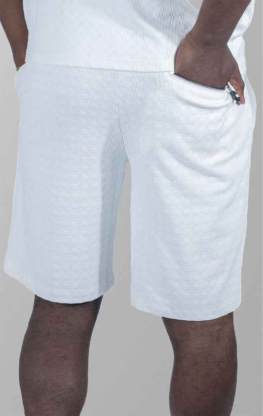 Modena Knit Shorts in white. Made from a high-quality blend of 95% cotton and 5% spandex for a soft and comfortable feel. Features a unique colored blocking design and a pre-shrunk true-to-size fit.