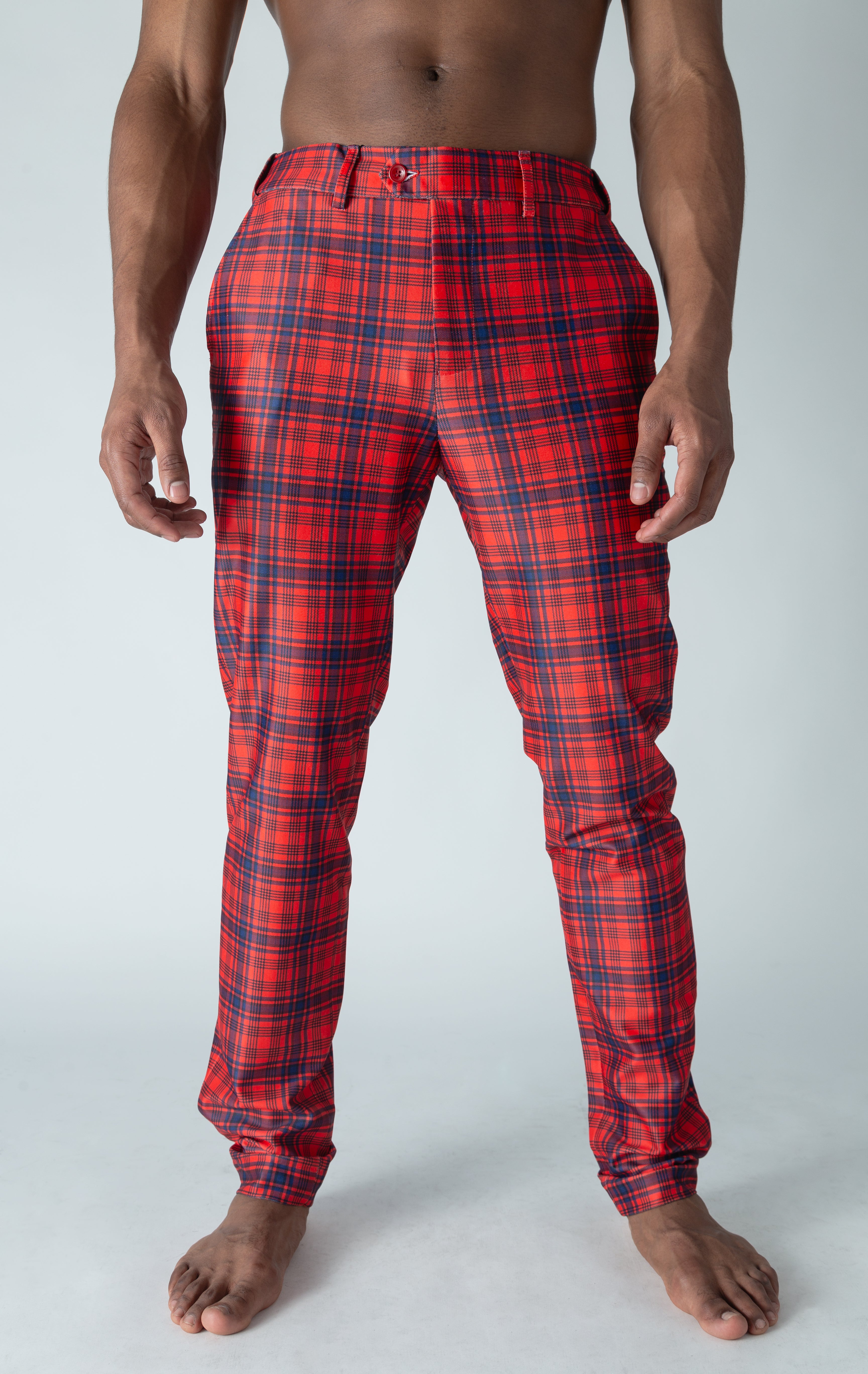 Men's red chino pants with a checkered plaid design. The pants feature an elastic waistband for comfort and stretch, and are made from a lightweight cotton-spandex blend fabric. Inseam is 32 inches.