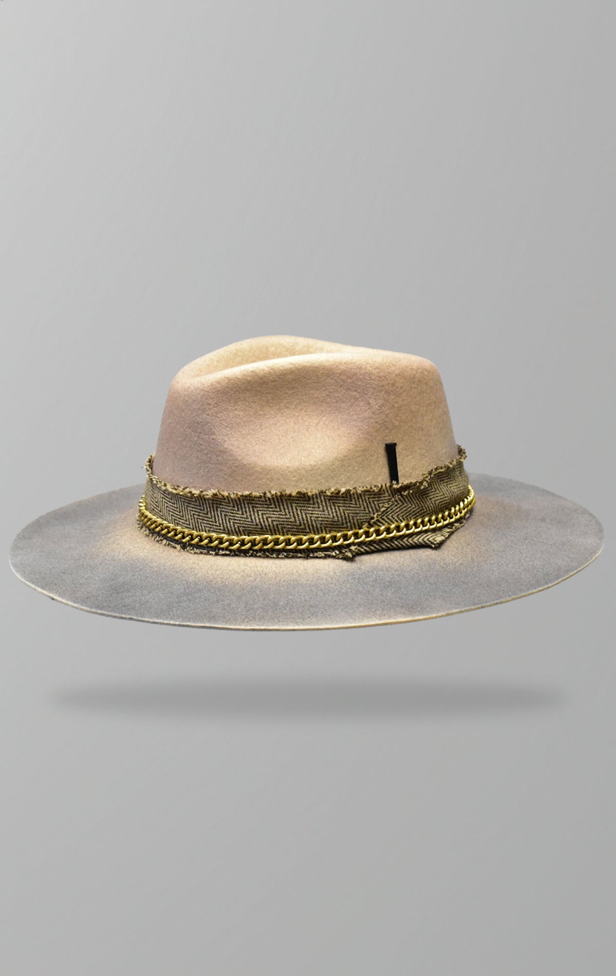 Wide brim fedora hat with frayed band, metal chain, and distressed effect, made from fine Australian wool.