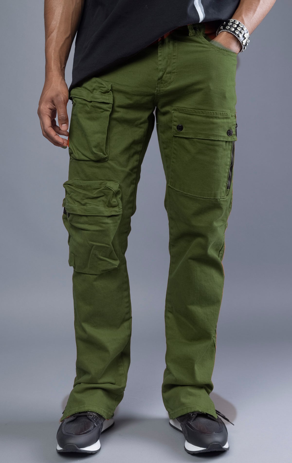 Men's cargo pants with multiple pockets for function. Regular, tapered fit with a comfortable rise. Available in orange and olive colors.