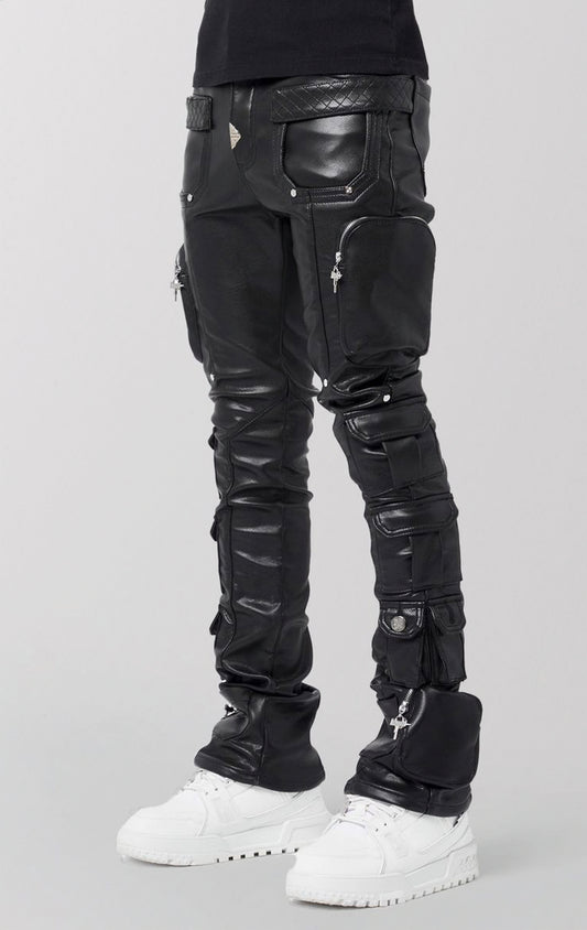 Black leather pants with unique design elements on a gray background