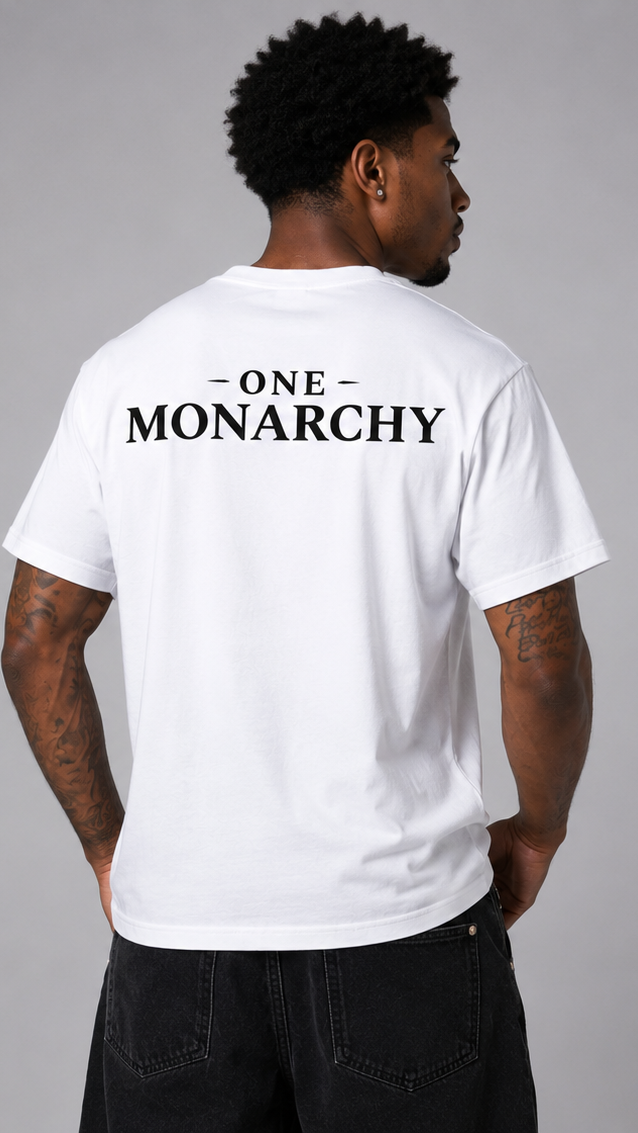A man wearing a white short-sleeve t-shirt with the brand name 'ONE MONARCHY' printed in black across the back, shown from behind against a neutral gray background.
