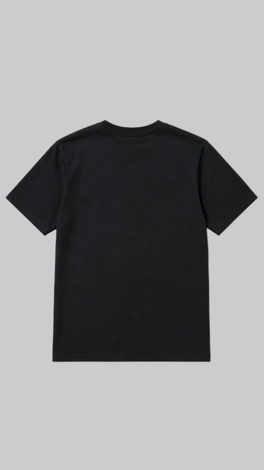 A plain black short-sleeve crewneck t-shirt shown from the back, laid flat against a light gray background.