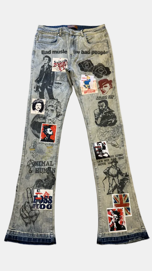 Distressed light-wash blue jeans covered in rock and metal themed patches, stickers, and graphic prints, including band logos and album art.
