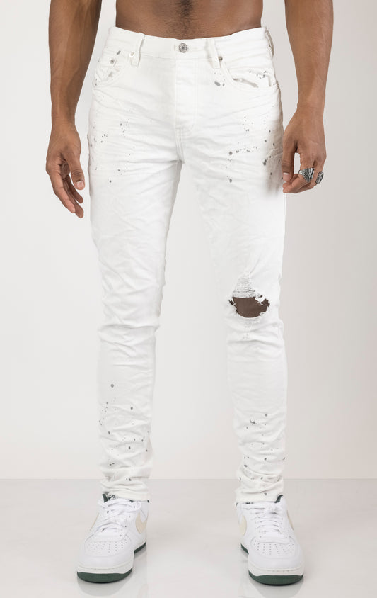 Unique jeans in dark wash (color may vary). Made from 98% cotton and 2% lycra for comfort. Features include a signature purple hangtag, lined back pockets and yoke for comfort and shape retention, reinforced belt loops, hidden back pocket rivets, and a classic button fly closure.