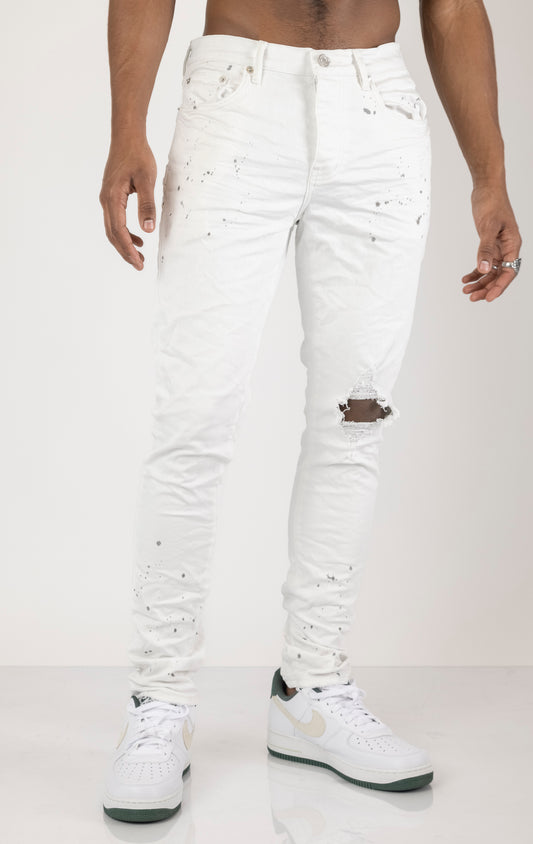 Unique jeans in dark wash (color may vary). Made from 98% cotton and 2% lycra for comfort. Features include a signature purple hangtag, lined back pockets and yoke for comfort and shape retention, reinforced belt loops, hidden back pocket rivets, and a classic button fly closure. 