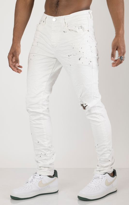 Unique jeans in dark wash (color may vary). Made from 98% cotton and 2% lycra for comfort. Features include a signature purple hangtag, lined back pockets and yoke for comfort and shape retention, reinforced belt loops, hidden back pocket rivets, and a classic button fly closure.