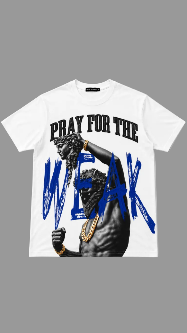 A white short-sleeve graphic t-shirt featuring a black and blue print of a classical statue and the text 'PRAY FOR THE WEAK' in black and blue, displayed flat against a neutral gray background.