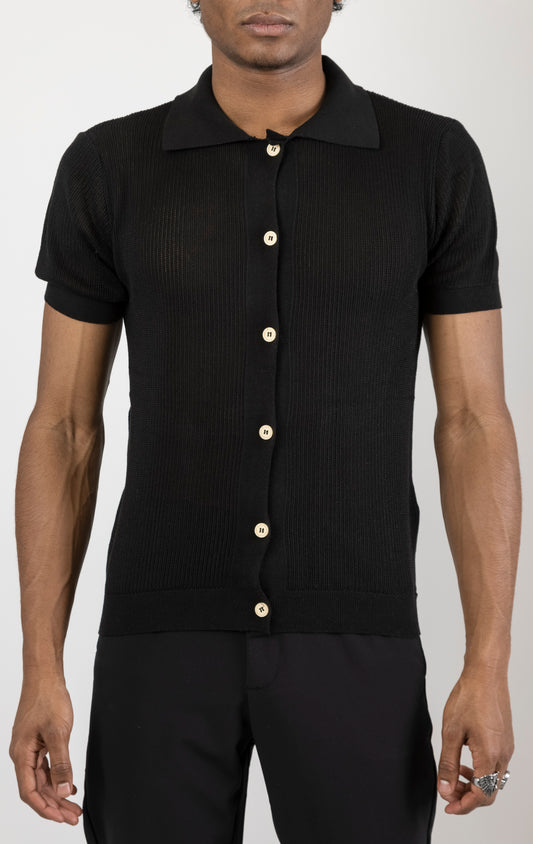 Men's see-through button-down mesh top in black. The top is made from a 50% cotton, 50% acrylic blend and features a tailored fit with a sheer mesh fabric and button-down closure.