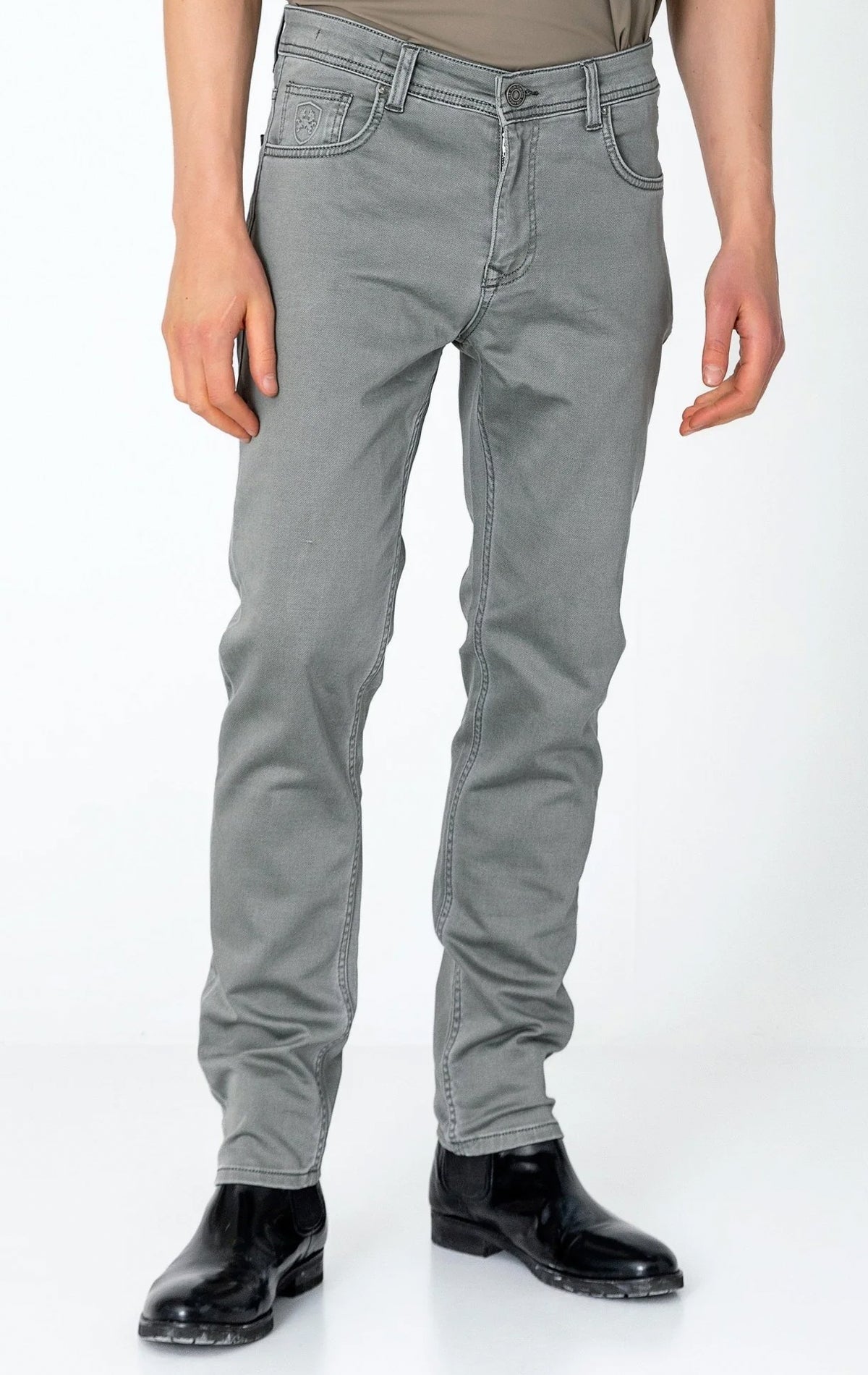Men's super soft 5-pocket style pants in grey color. The pants are made from a 98% cotton, 2% elastane blend and feature a tailored fit with a hint of stretch, classic 5-pocket styling (two front pockets, two back pockets, and a coin pocket).