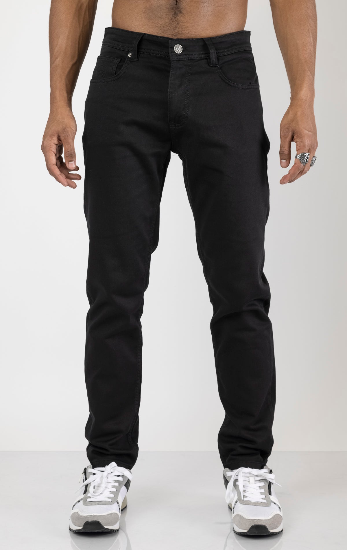 Men's super soft 5-pocket style pants in black color. The pants are made from a 98% cotton, 2% elastane blend and feature a tailored fit with a hint of stretch, classic 5-pocket styling (two front pockets, two back pockets, and a coin pocket).