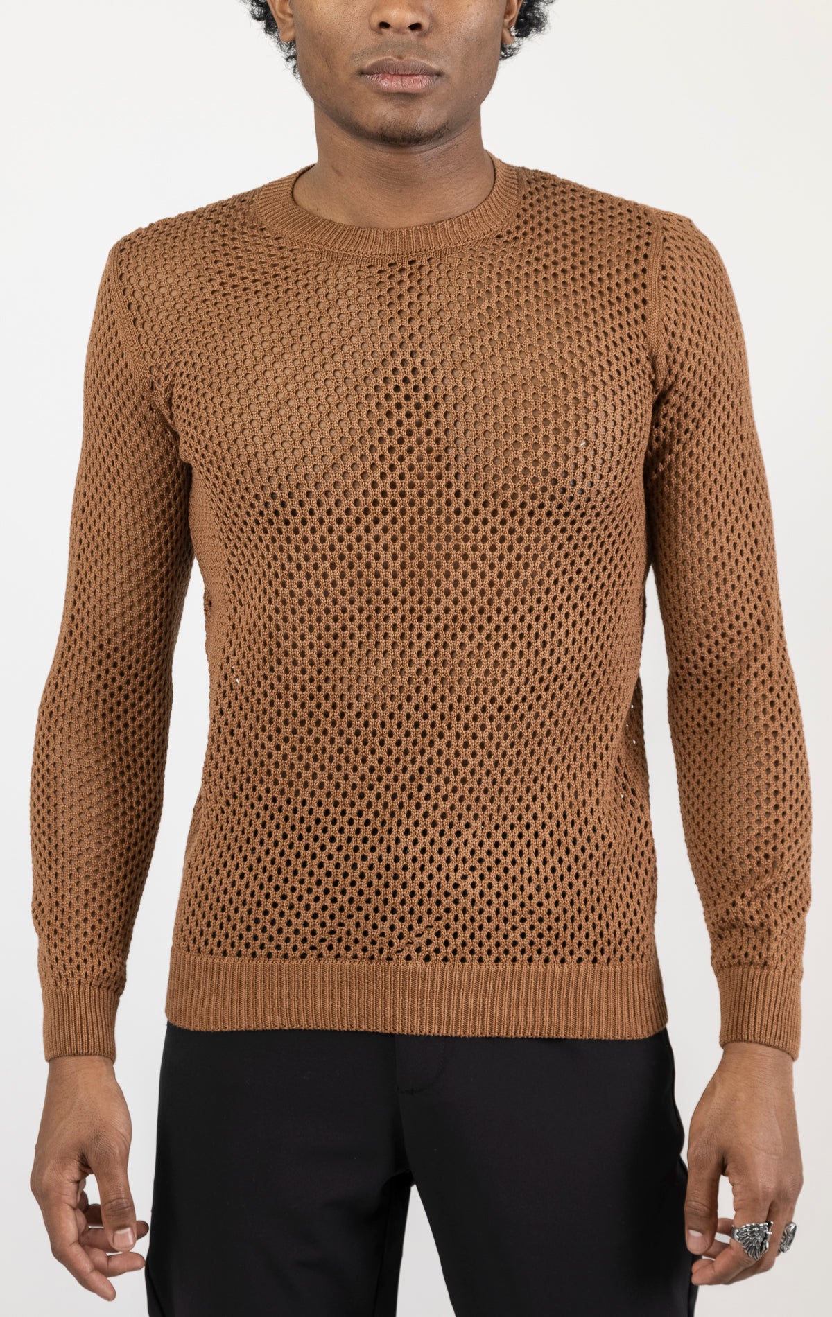 Men's see-through fishnet muscle fit shirt in brown. The shirt is made from a 50% cotton, 50% acrylic blend and features a muscle fit silhouette with a see-through fishnet fabric design.