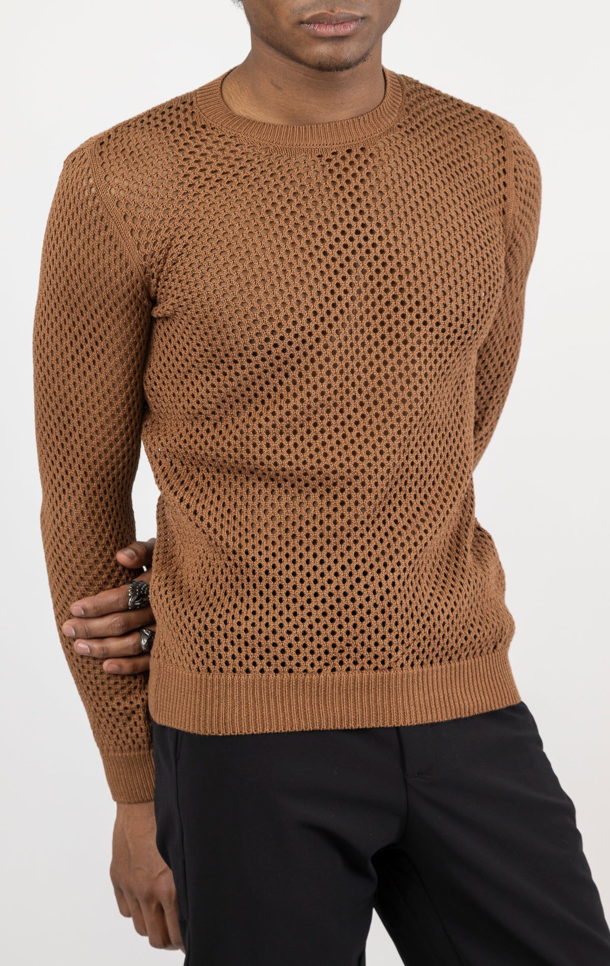 Men's see-through fishnet muscle fit shirt in brown. The shirt is made from a 50% cotton, 50% acrylic blend and features a muscle fit silhouette with a see-through fishnet fabric design.