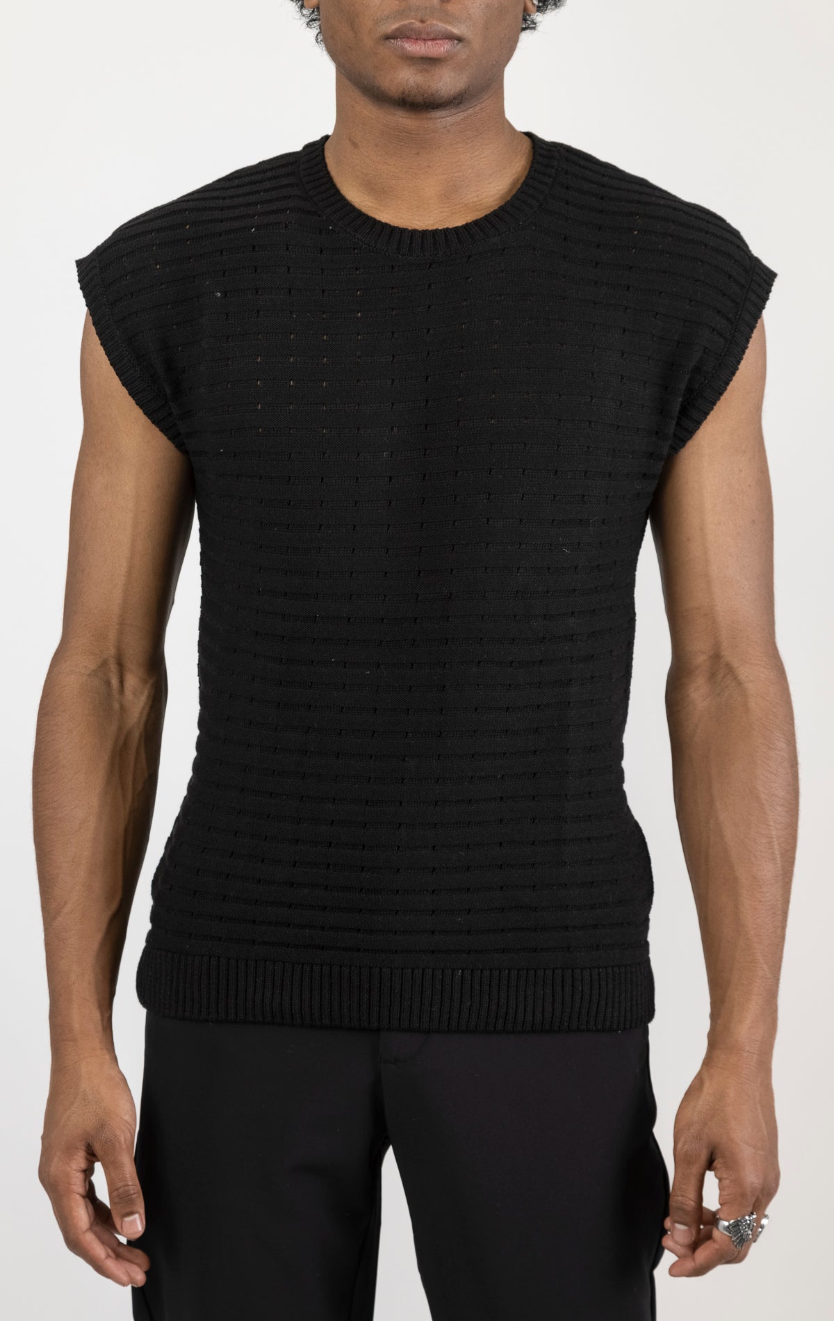 Men's black eyelet short sleeve knit top and shorts set in a variety of colors. The set is made from a soft and breathable knit fabric (50% viscose, 50% polyamide) and features a relaxed-fit top with eyelet detailing on the short sleeves and comfortable shorts with an elastic waistband.