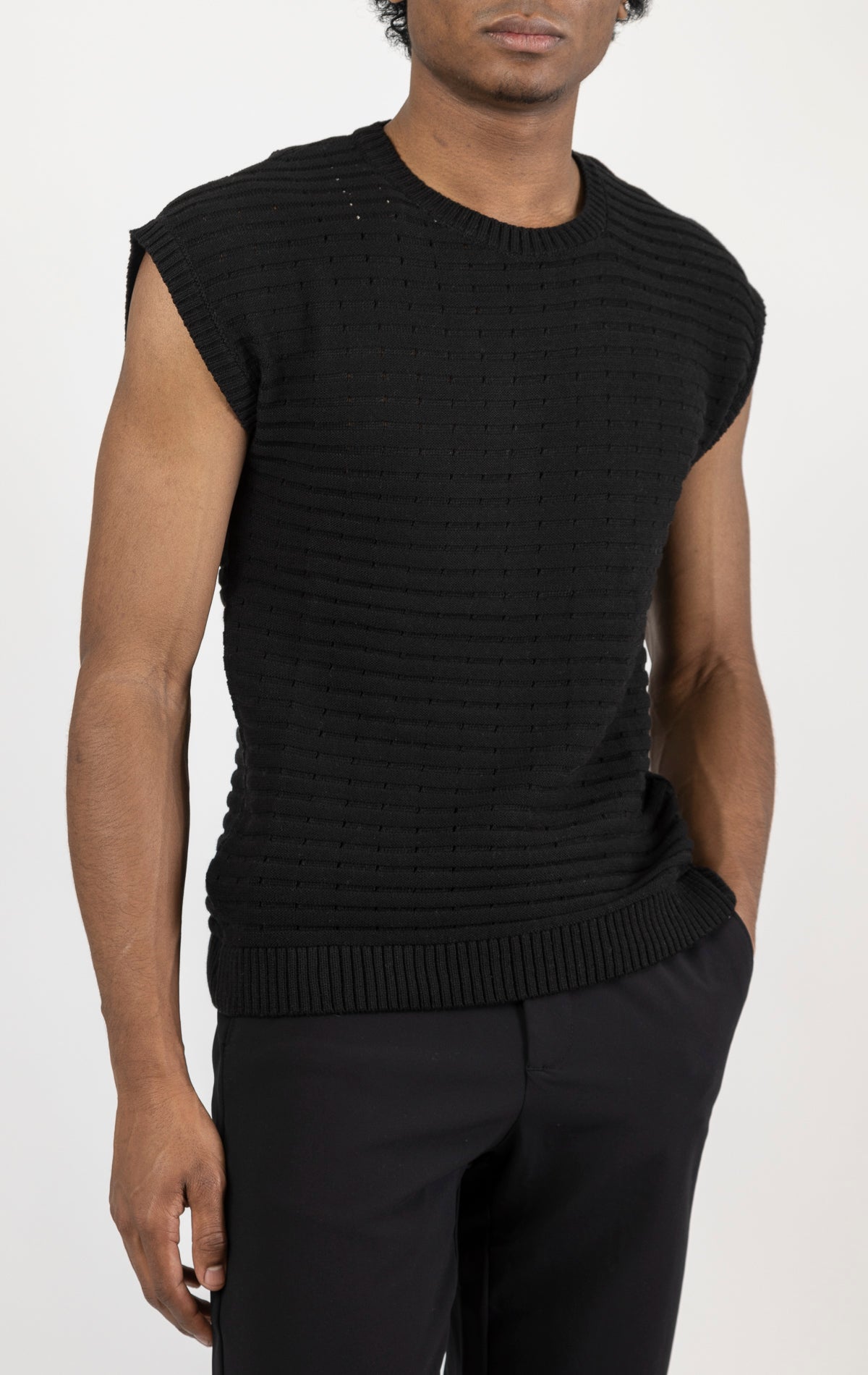 Men's black eyelet short sleeve knit top and shorts set in a variety of colors. The set is made from a soft and breathable knit fabric (50% viscose, 50% polyamide) and features a relaxed-fit top with eyelet detailing on the short sleeves and comfortable shorts with an elastic waistband.