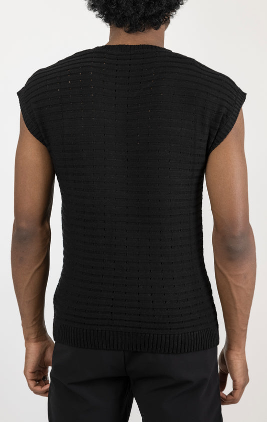Men's black eyelet short sleeve knit top and shorts set in a variety of colors. The set is made from a soft and breathable knit fabric (50% viscose, 50% polyamide) and features a relaxed-fit top with eyelet detailing on the short sleeves and comfortable shorts with an elastic waistband.