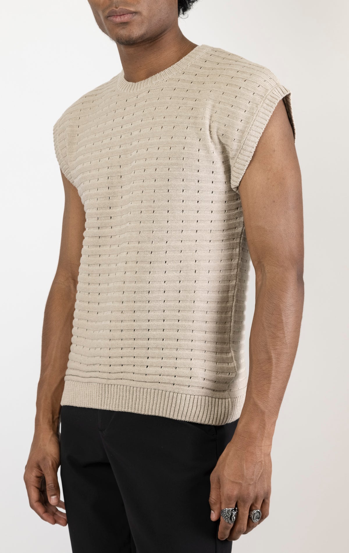 Men's stone eyelet short sleeve knit top and shorts set in a variety of colors. The set is made from a soft and breathable knit fabric (50% viscose, 50% polyamide) and features a relaxed-fit top with eyelet detailing on the short sleeves and comfortable shorts with an elastic waistband.