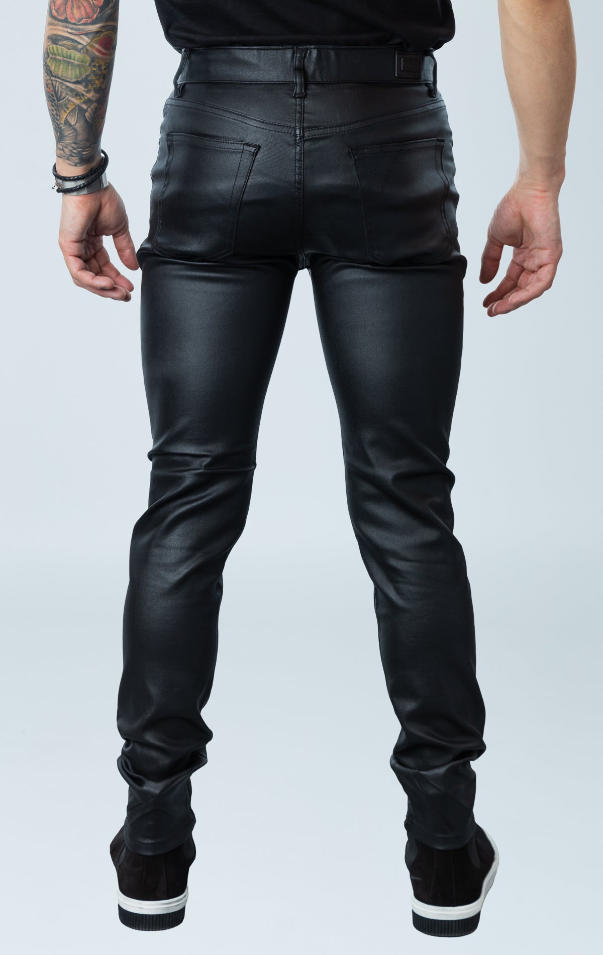 Men's gleaming dress pants with elastic waistband, shiny metallic finish, and added stretch.