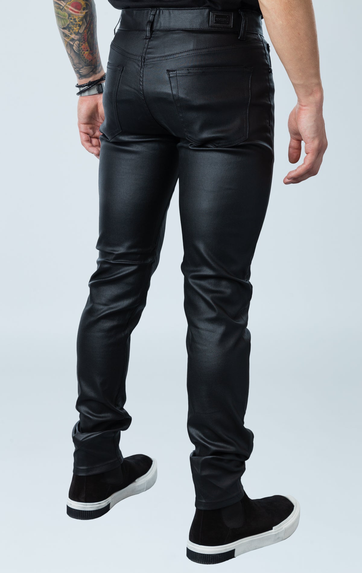 Men's gleaming dress pants with elastic waistband, shiny metallic finish, and added stretch.