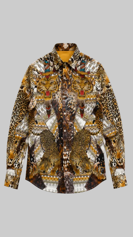 A long-sleeve button-up shirt featuring an intricate, all-over mixed-media print of leopards, lions, and tribal patterns in brown, gold, black, white, and red, displayed flat against a plain white background.