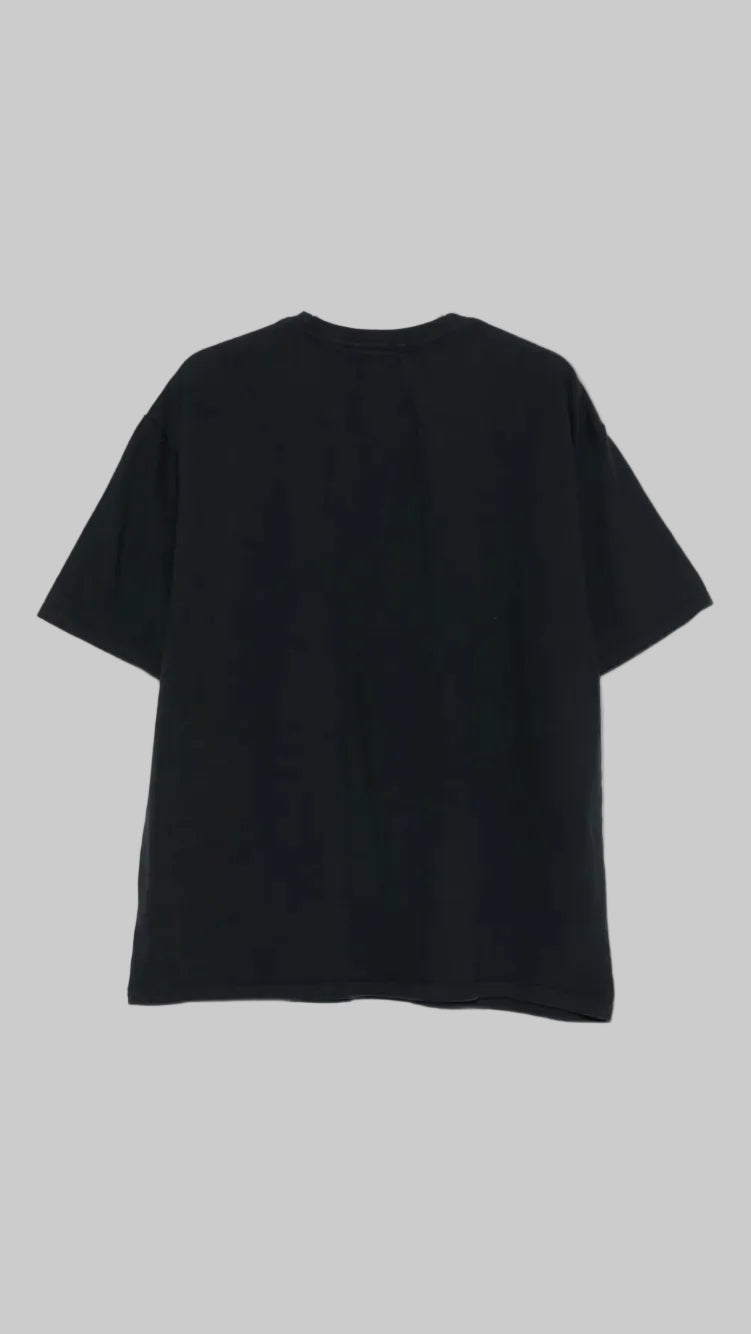 Black t-shirt on a light grey background