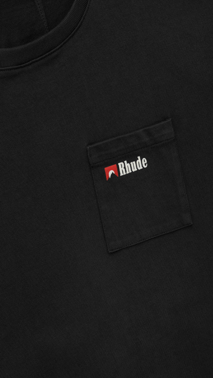Black t-shirt  with a logo on the chest pocket 
