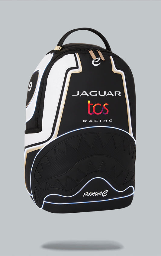 Sprayground x Formula E Jaguar backpack with built-in LED lights. Black water-resistant PVC backpack with Formula E Jaguar design. Includes laptop compartment, organizer pocket, and USB cable for charging. Note: Lithium battery inside, check with airline before travel.