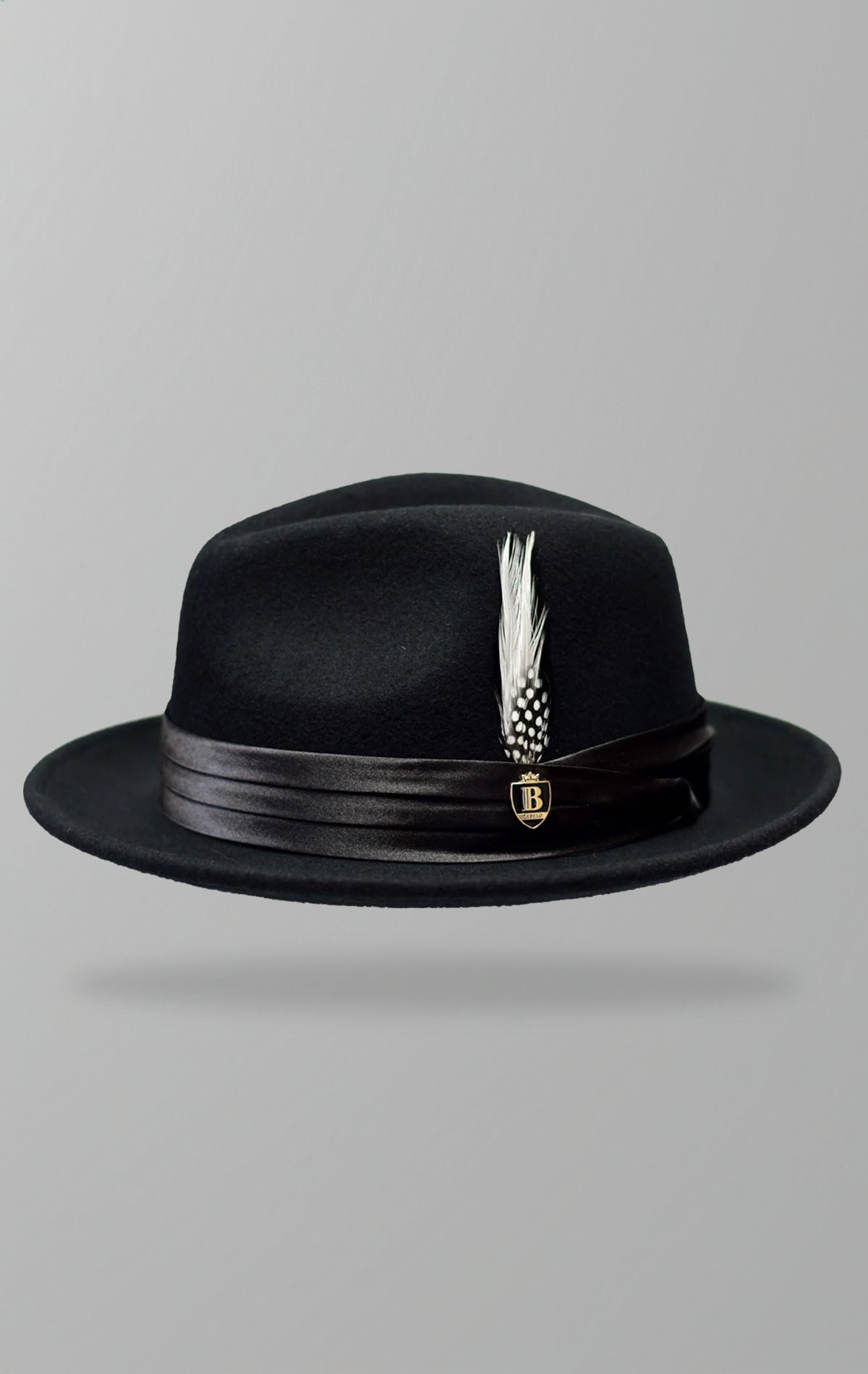 Classic wool fedora crafted from 100% fine Australian wool with a 2.25-inch brim, satin hat band, and removable logo pin.