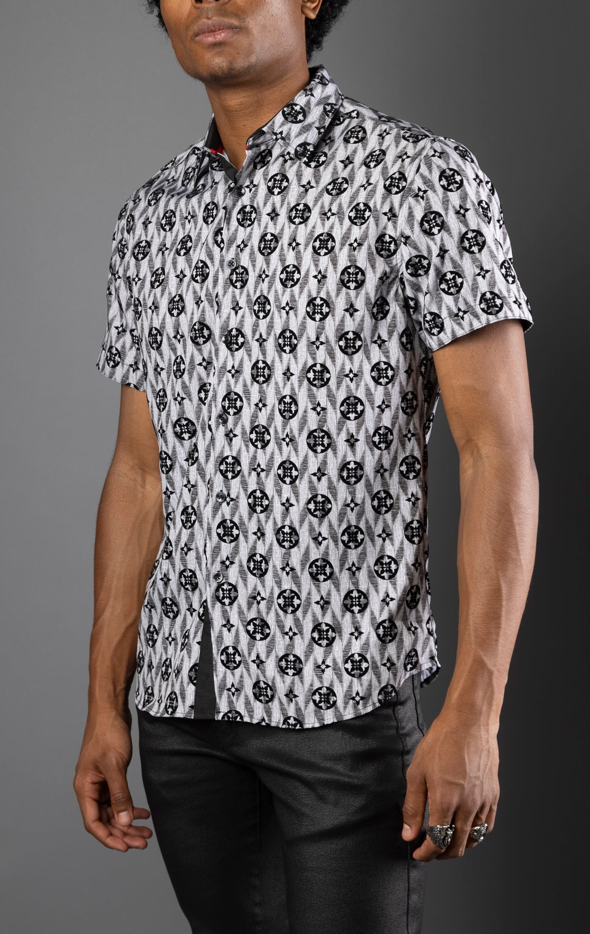 Men's casual, relaxed-fit button-down shirt with a short sleeve design. The shirt features an all-over Greek key pattern and a front button closure.